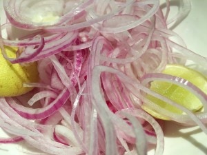 Raw Red Onion Ring Salad with Lime Wedge