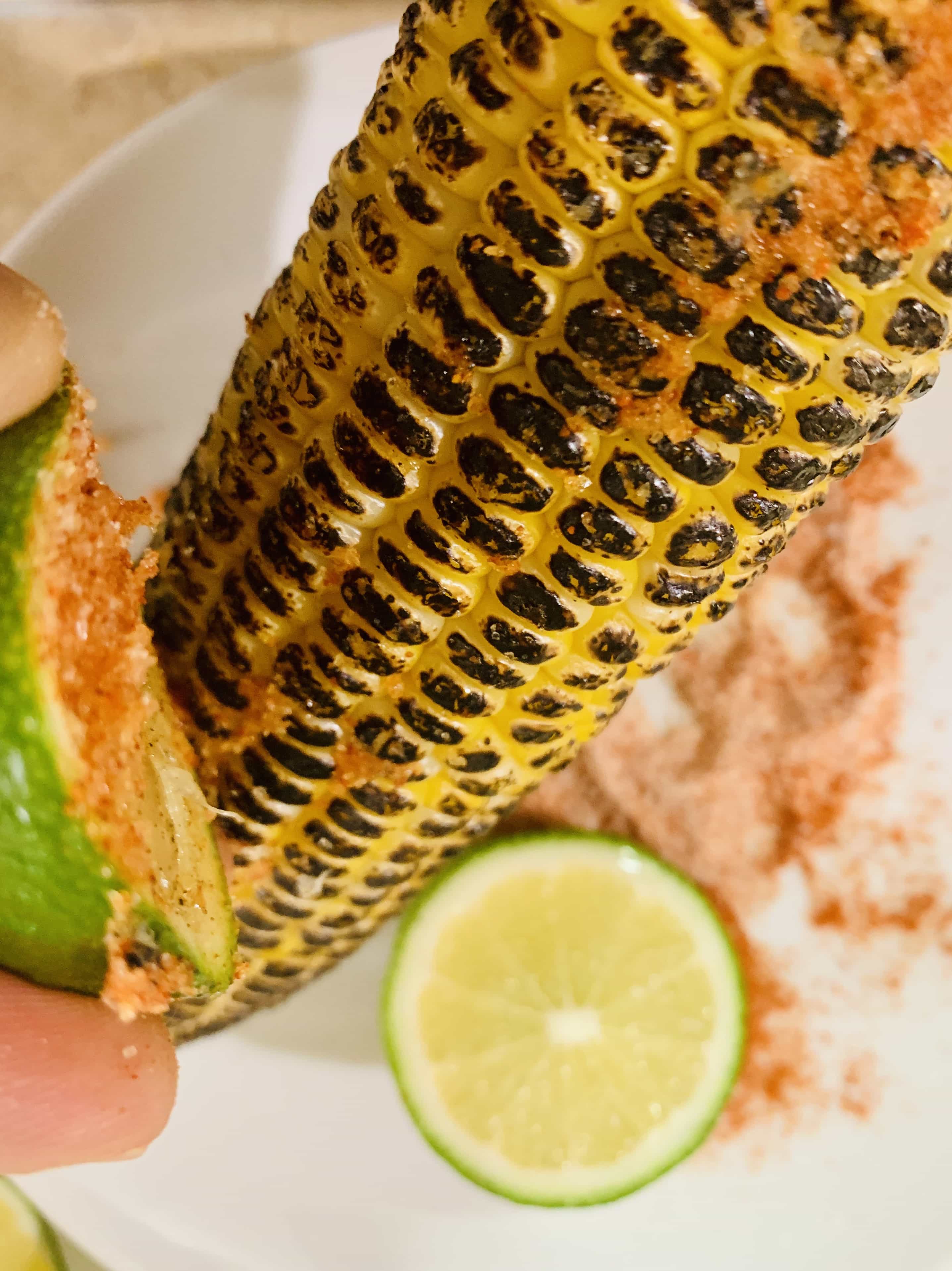 bhutta with creme brulee torch or a grilled corn or bhutta or kanis rubbed with lemon dipped in salt and chili powder