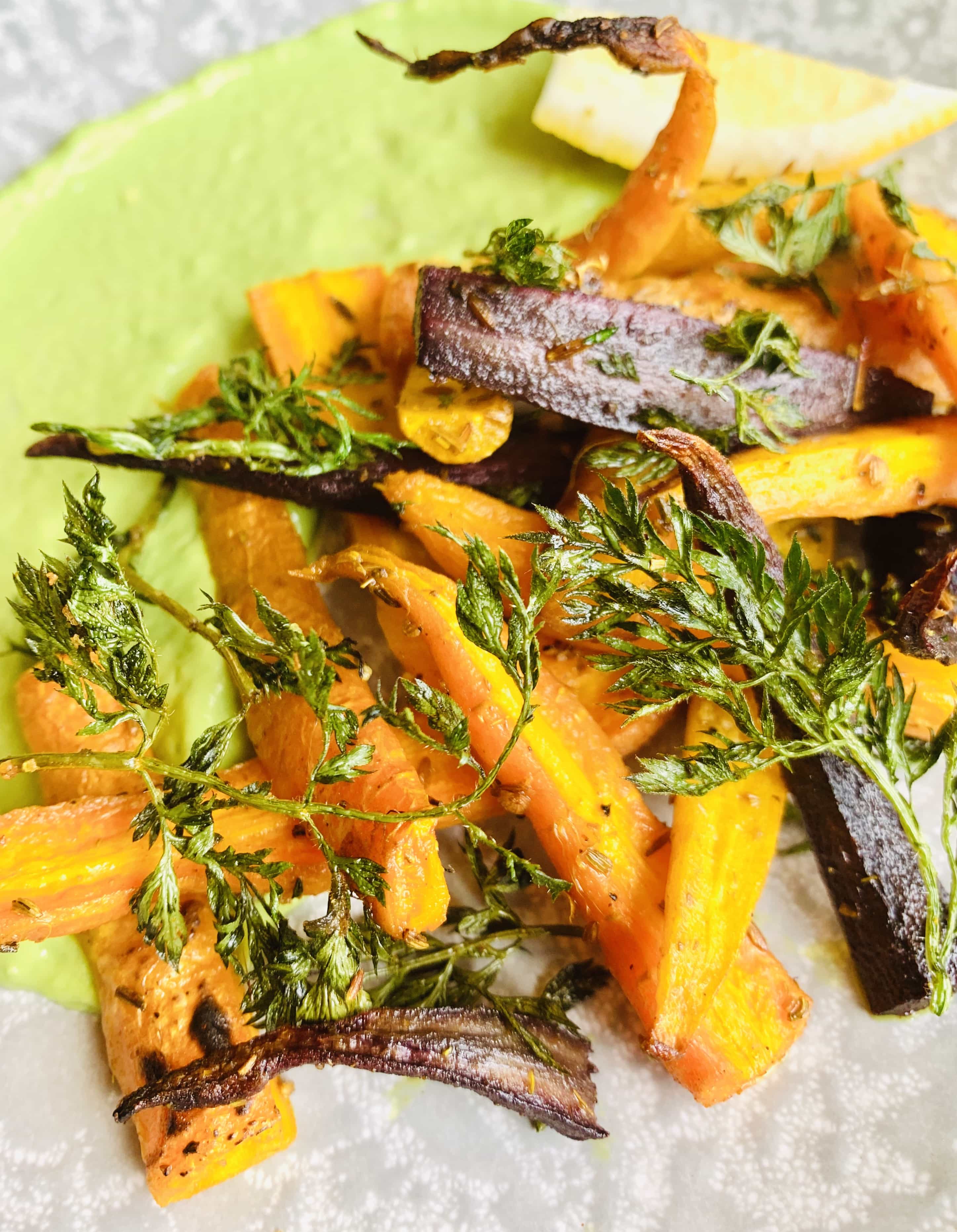Carrot chips with avocado and garlic chives dip
